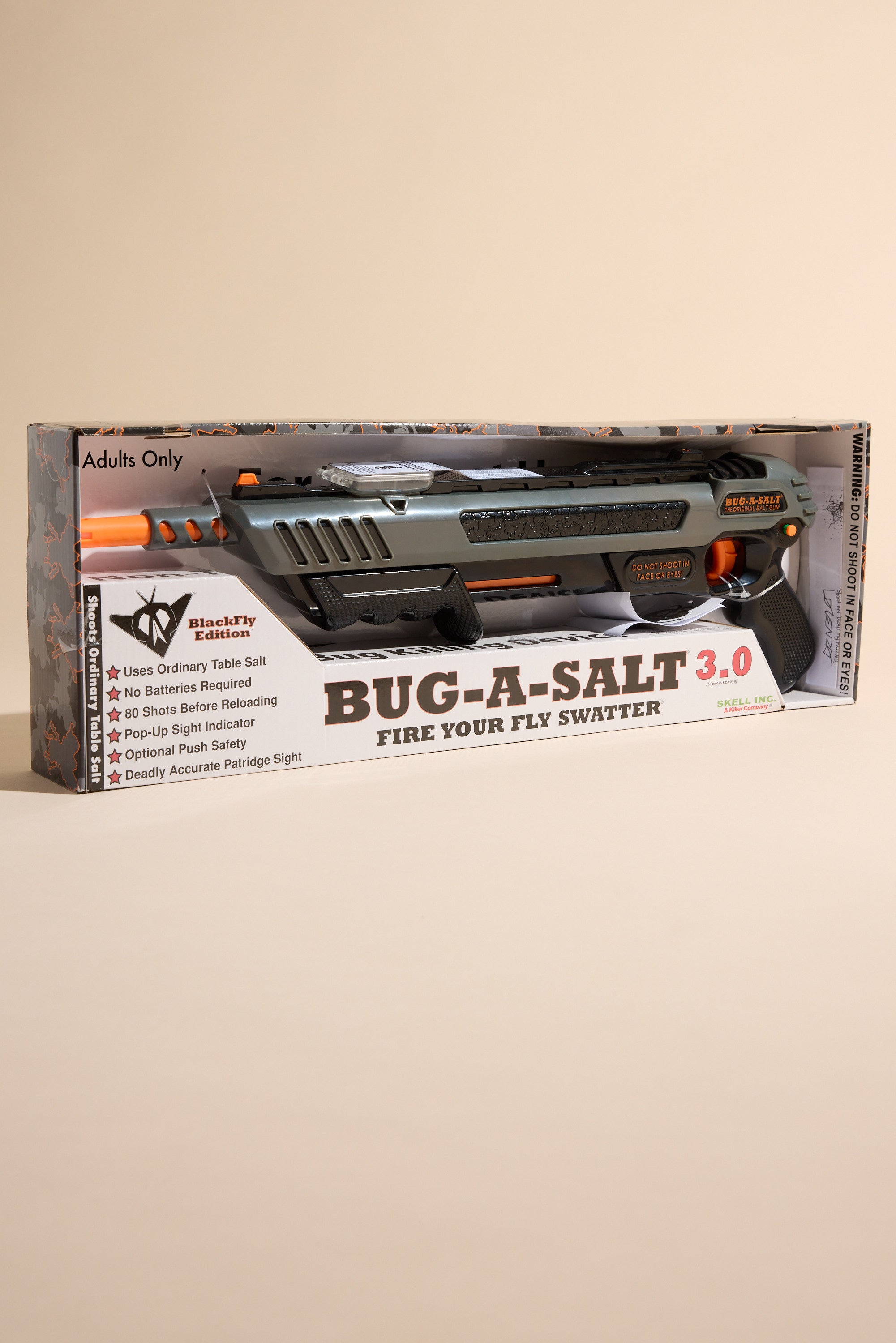 A boxed Bug-A-Salt 3.0 Black Fly by Other stands upright, showcasing its salt-shooting fly elimination, no batteries needed, easy reload, adjustable sights, and adults-only label on the packaging.