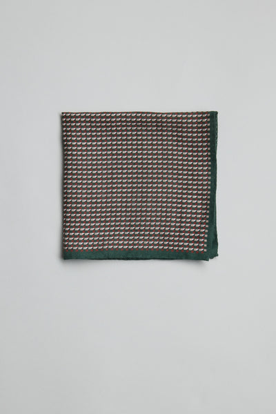 Parisian Geo Linen Pocket Square in dark green with small red and white geometric pattern.