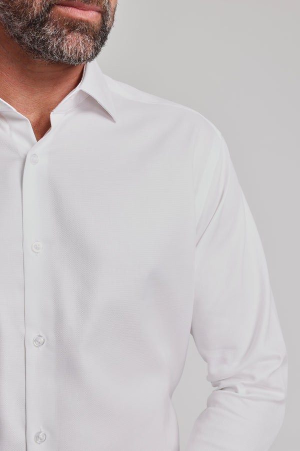 A close-up shows a man wearing the Barkers Mexted Texture Shirt. Only the lower half of his salt-and-pepper bearded face and upper torso appear, set against a light grey background.