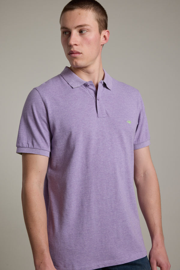 A man in a Barkers Regent Pique Polo with crayfish embroidery looks left, plain background.