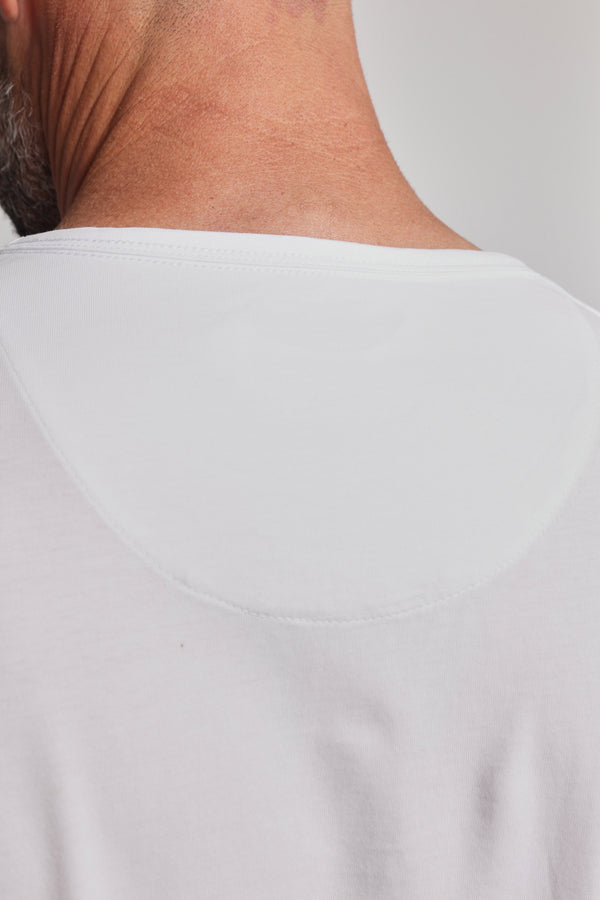 Close-up of the back neckline and shoulders of a person wearing the Barkers Linton Supima Tee, crafted from Mercerised Supima Cotton. The image highlights the precise stitching, short hair, and skin for a classic look.