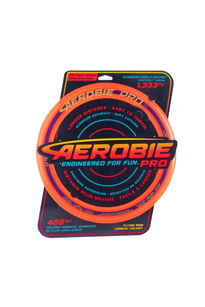 An Aerobie PRO flying disc by Other, in bright orange packaging with blue and black accents, highlights its world record throw, long-distance flight, and easy-to-throw design in bold text.