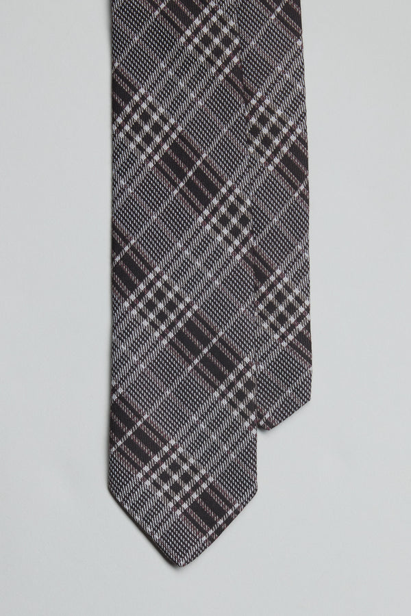 A close-up of two overlapping Parisian Hutton Check Ties by Parisian, handmade in New Zealand with a black, white, and burgundy plaid pattern, displayed on a plain white background.