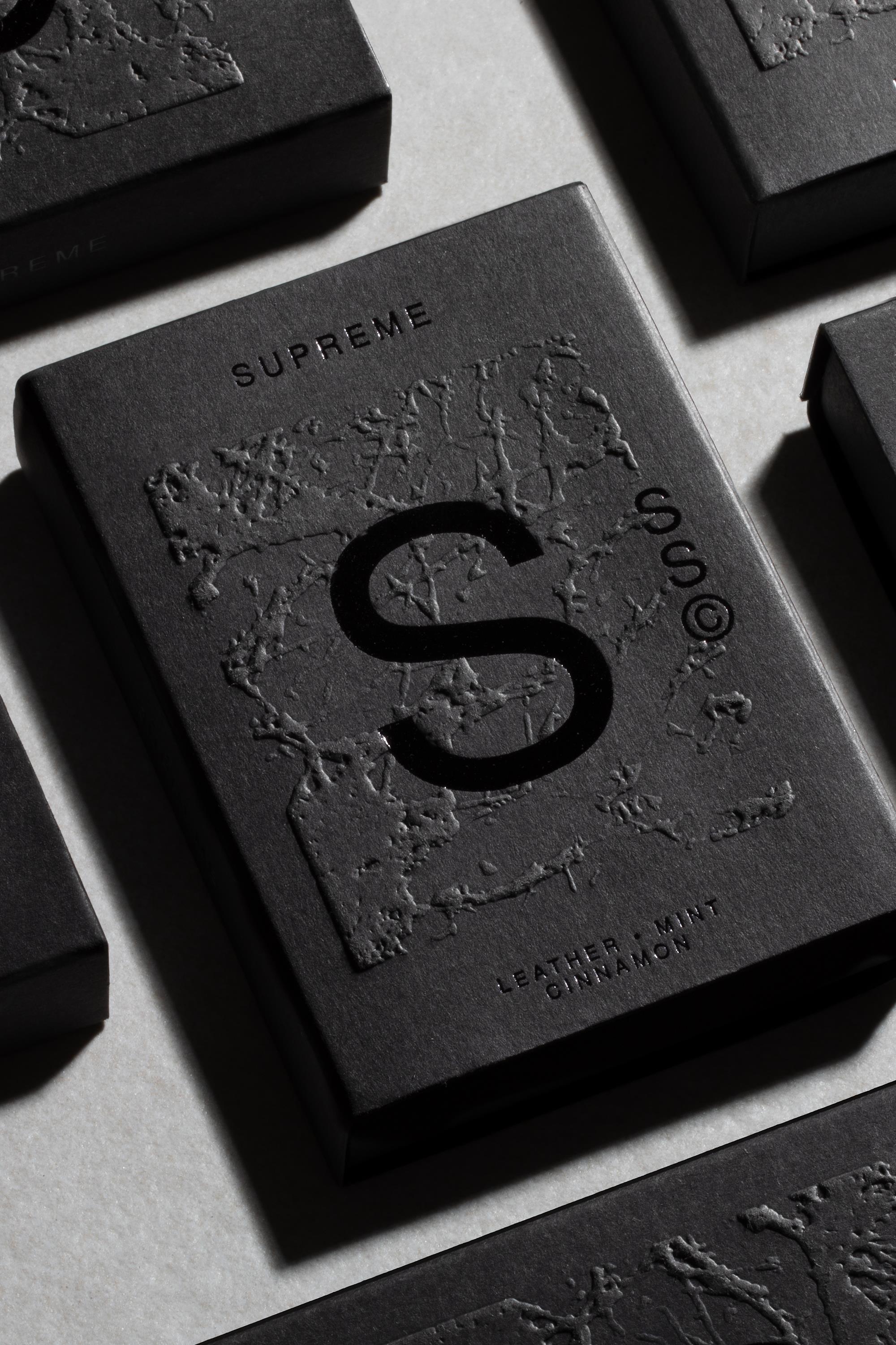 Solid State - Supreme by Solid State comes in a black rectangular box with a large embossed S and textured design. This wax-based cologne provides a long-lasting scent featuring notes of leather, mint, and cinnamon.