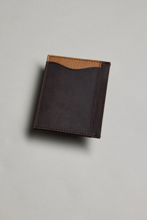The Barkers Taylor Leather Card Wallet, a closed slim card holder in brown leather with a tan accent on the top edge, is shown photographed on a light gray surface.