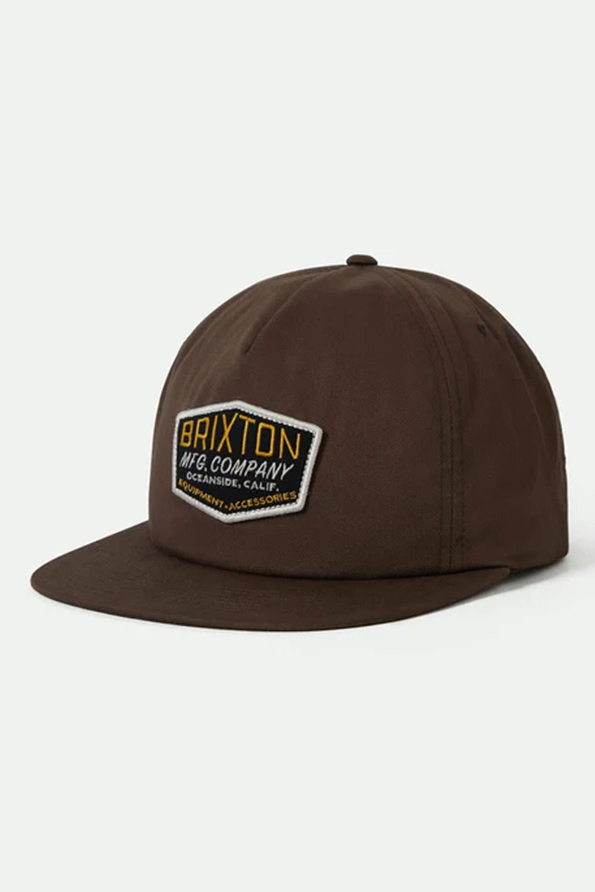 The Brixton Coleson HP Snapback is a brown, high-profile hat with a flat brim and a front patch reading BRIXTON MFG. COMPANY in yellow and white, giving this retro Brixton cap a classic look.