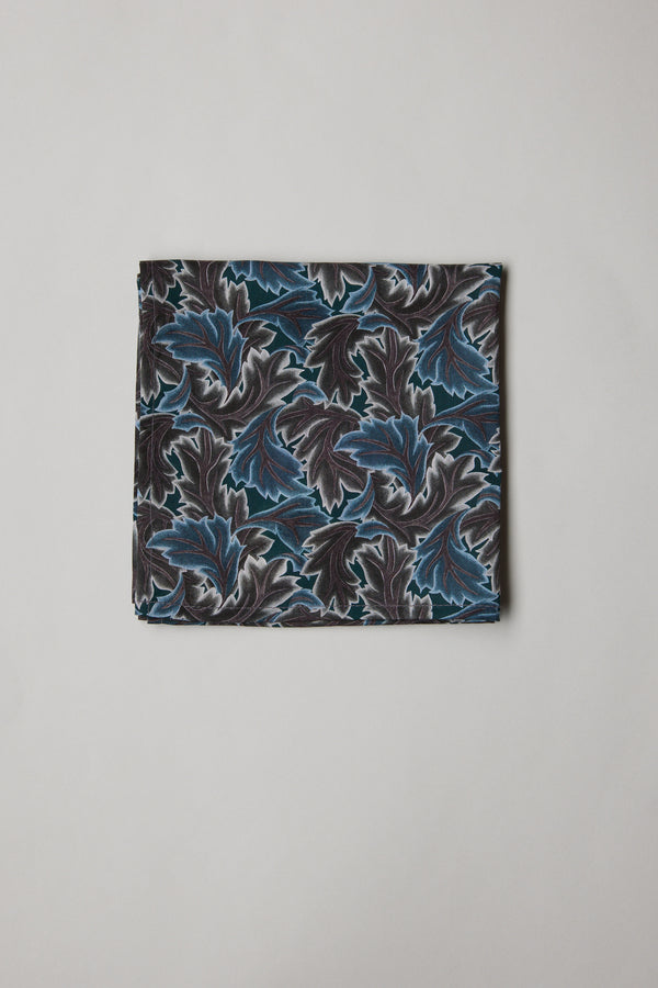 Liberty Midnight Canopy Pocket Square in blue, black & white leafy print on light background.