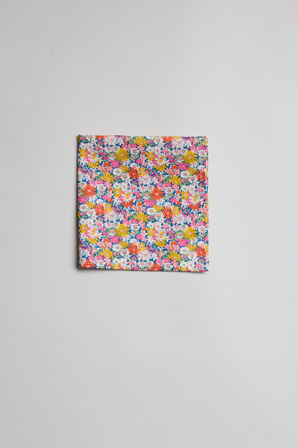 The Liberty Libby Pocket Square features a colorful floral print on soft Tana Lawn cotton.
