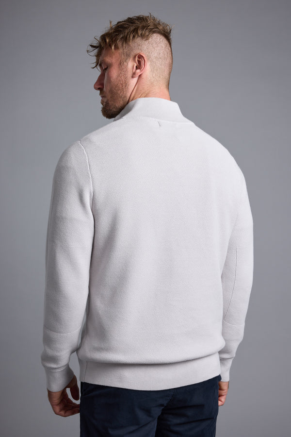 Man with short, messy hair in Barkers Gaston Cotton 1/4 Zip Sweater, back view.