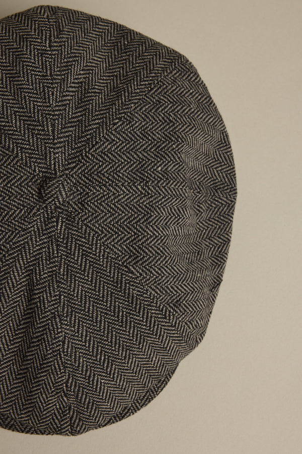Brixton Brood Snap Cap in gray wool blend, shown from above on a beige background.