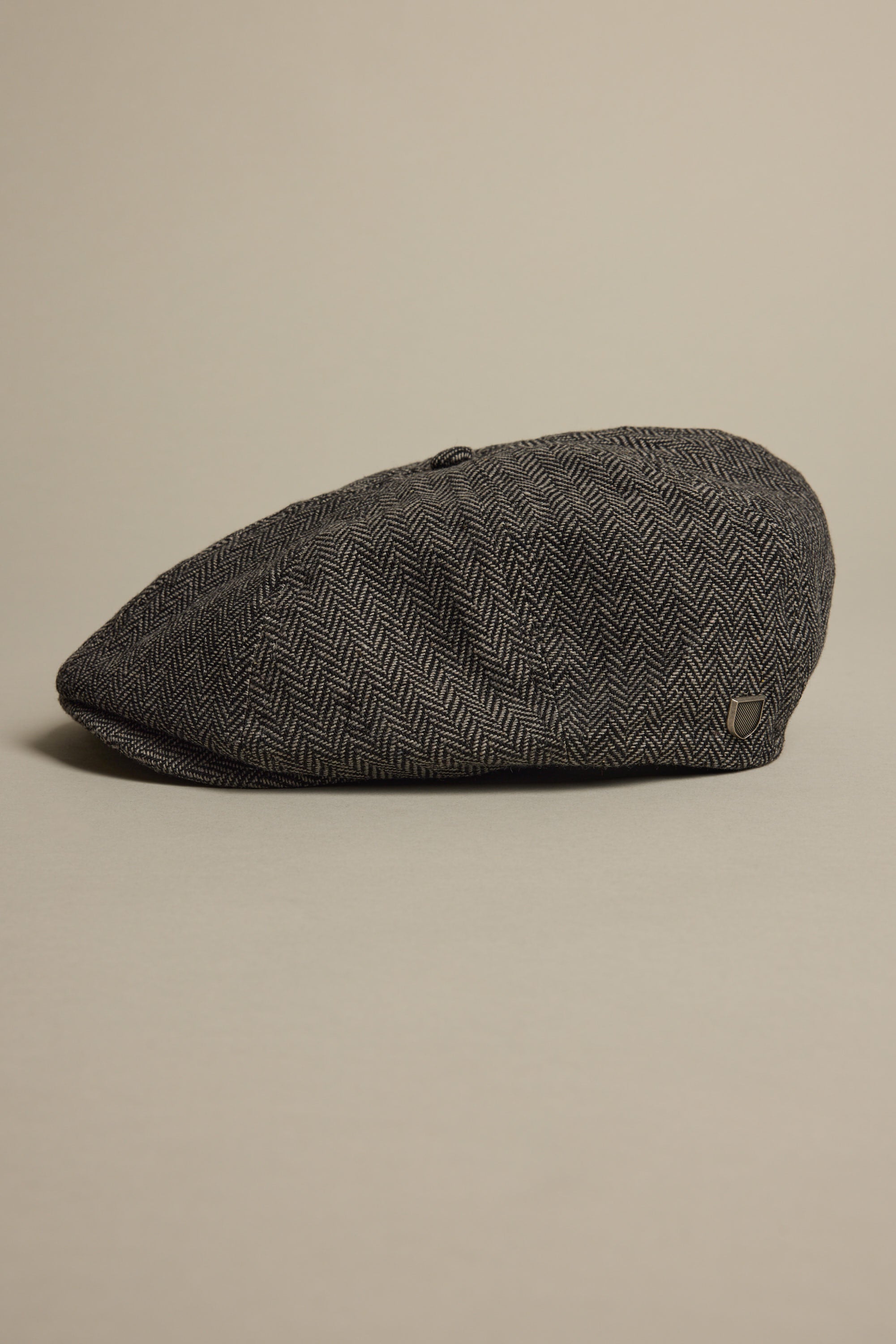 Brixton Brood Snap Cap in gray herringbone wool blend on a neutral background.