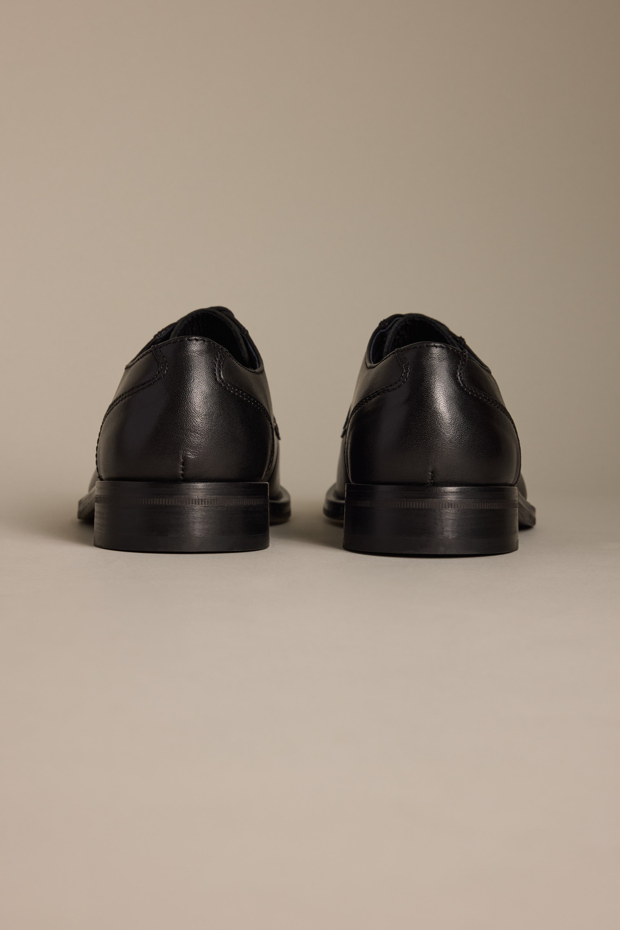 Barkers Clayton Dress Shoe for men, premium leather, shown from the back on a neutral background.