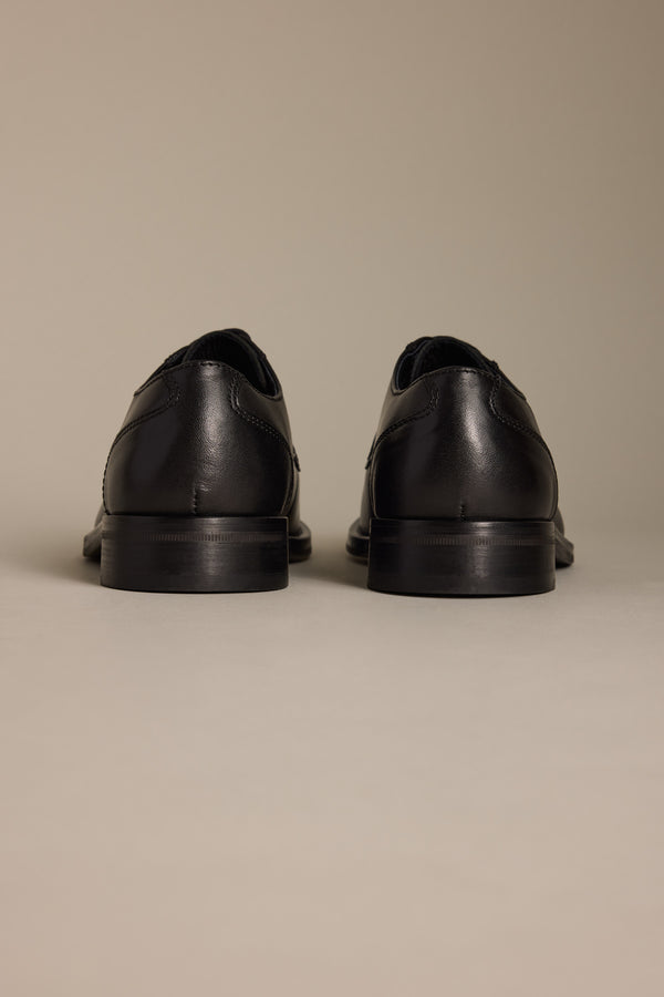 Barkers Clayton Dress Shoe for men, premium leather, shown from the back on a neutral background.