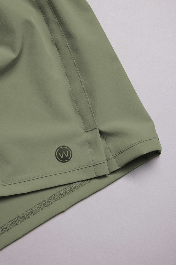 WearEver Cadence Short in green, lifestyle shot