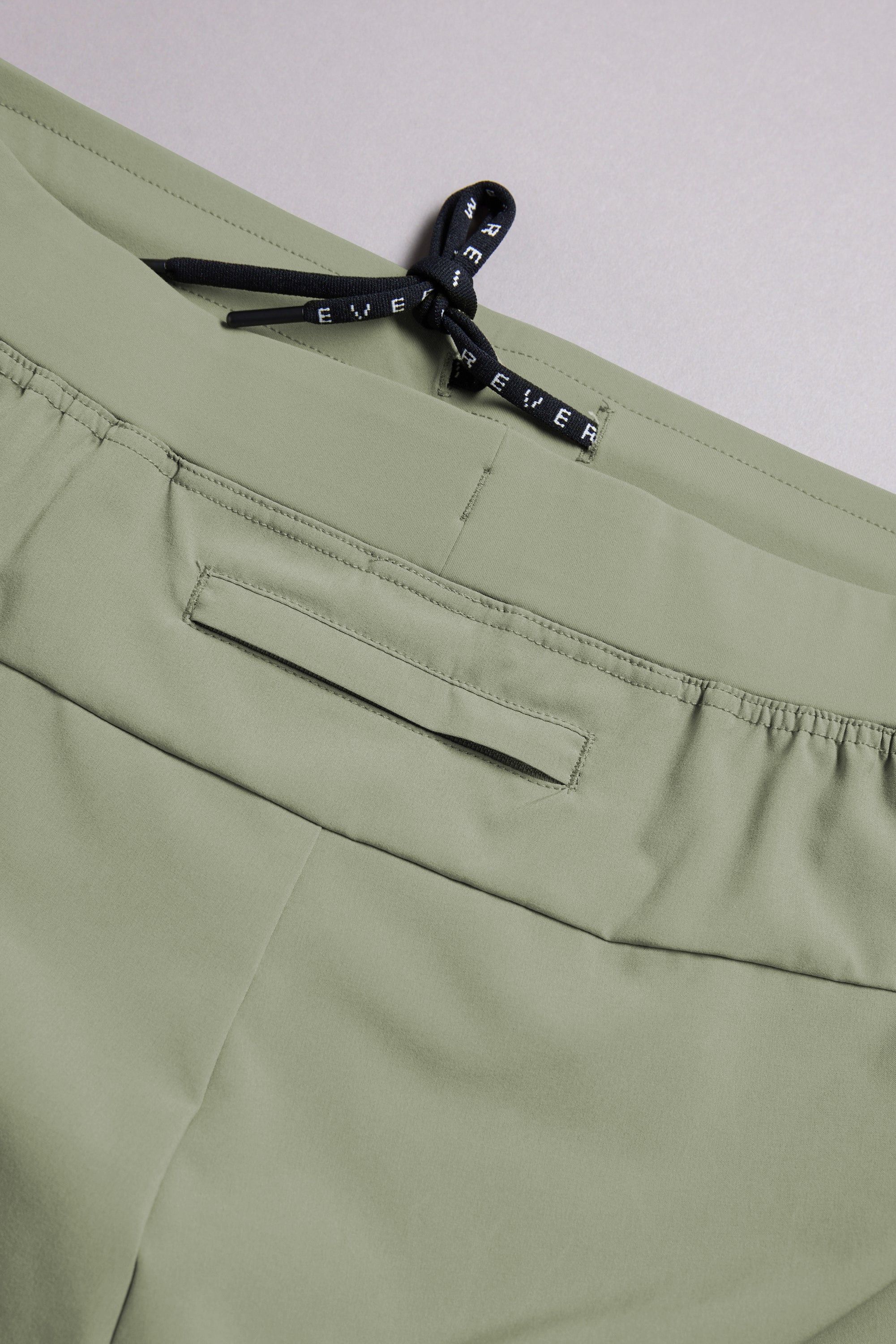 WearEver Cadence Short in green, flat lay