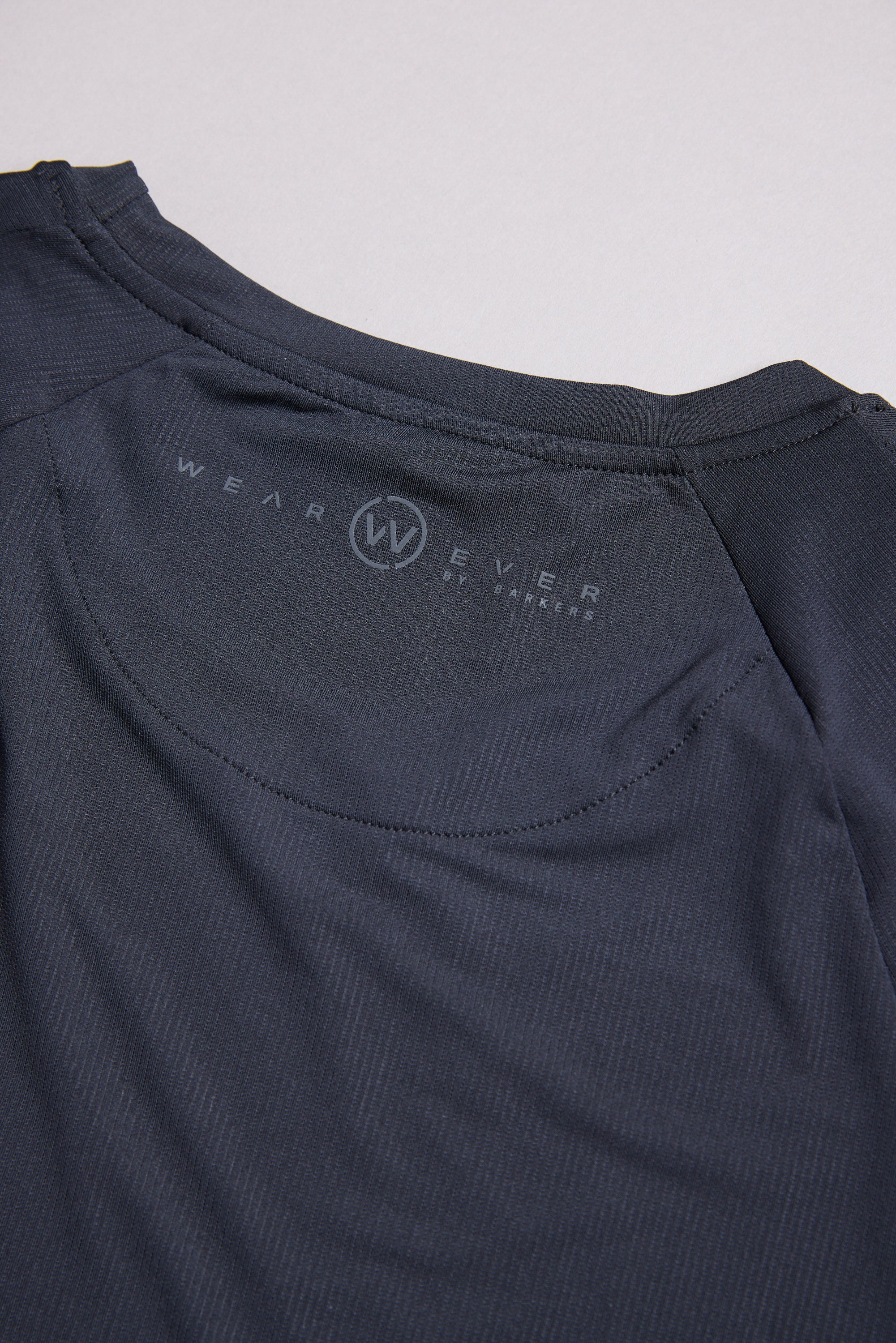 WearEver Pulse Long Sleeve Tee in black, lifestyle shot