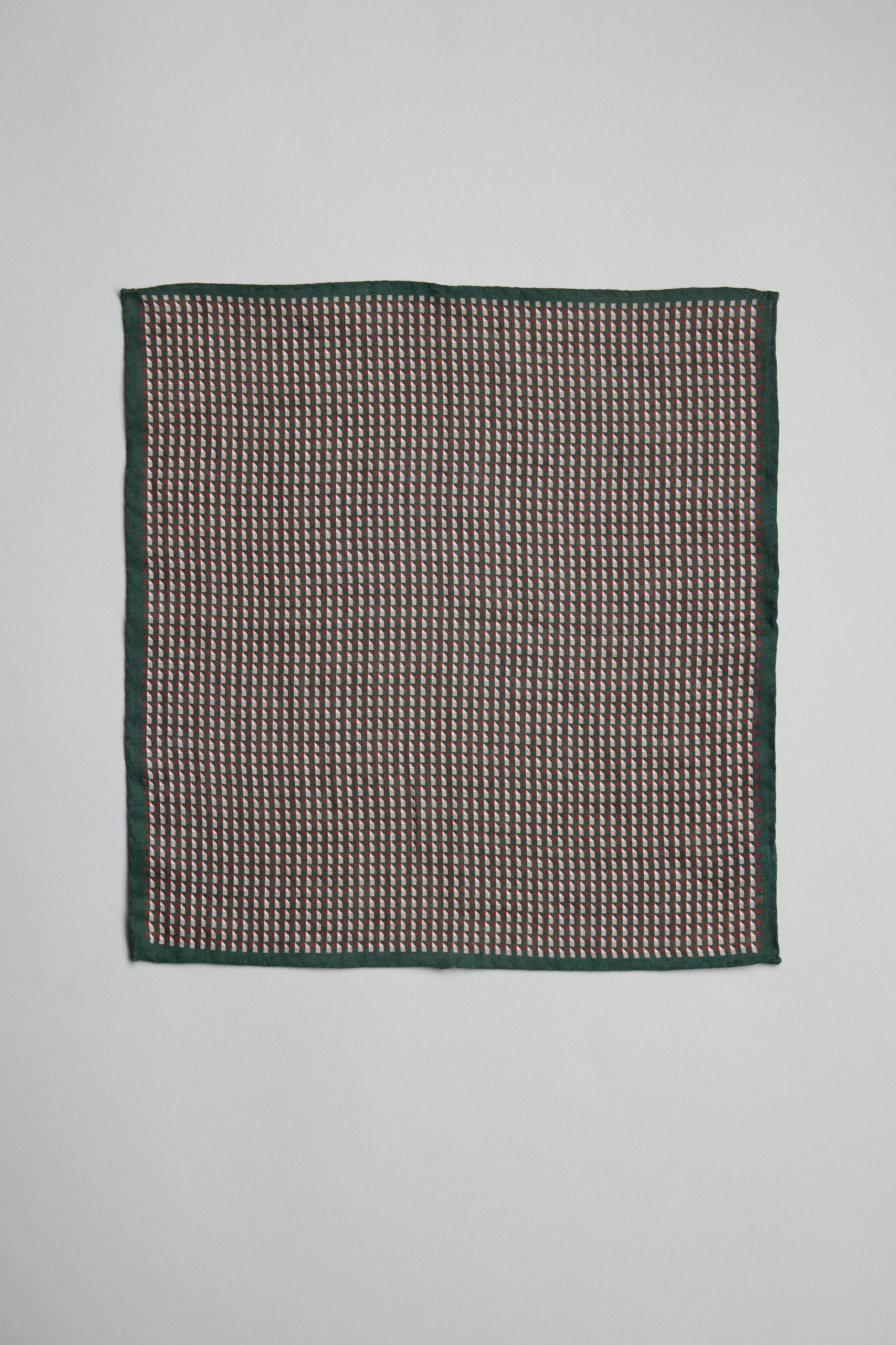 Parisian Geo Linen Pocket Square by Parisian, geometric print with dark border on light background.